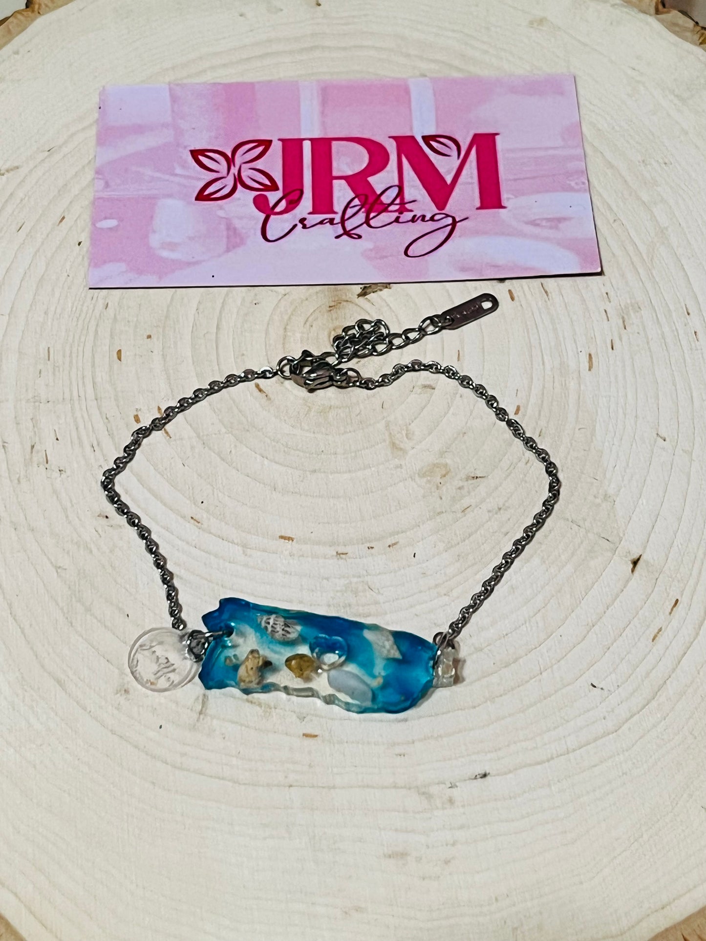 Pulsera artesanal encapsulado de arena de playa
