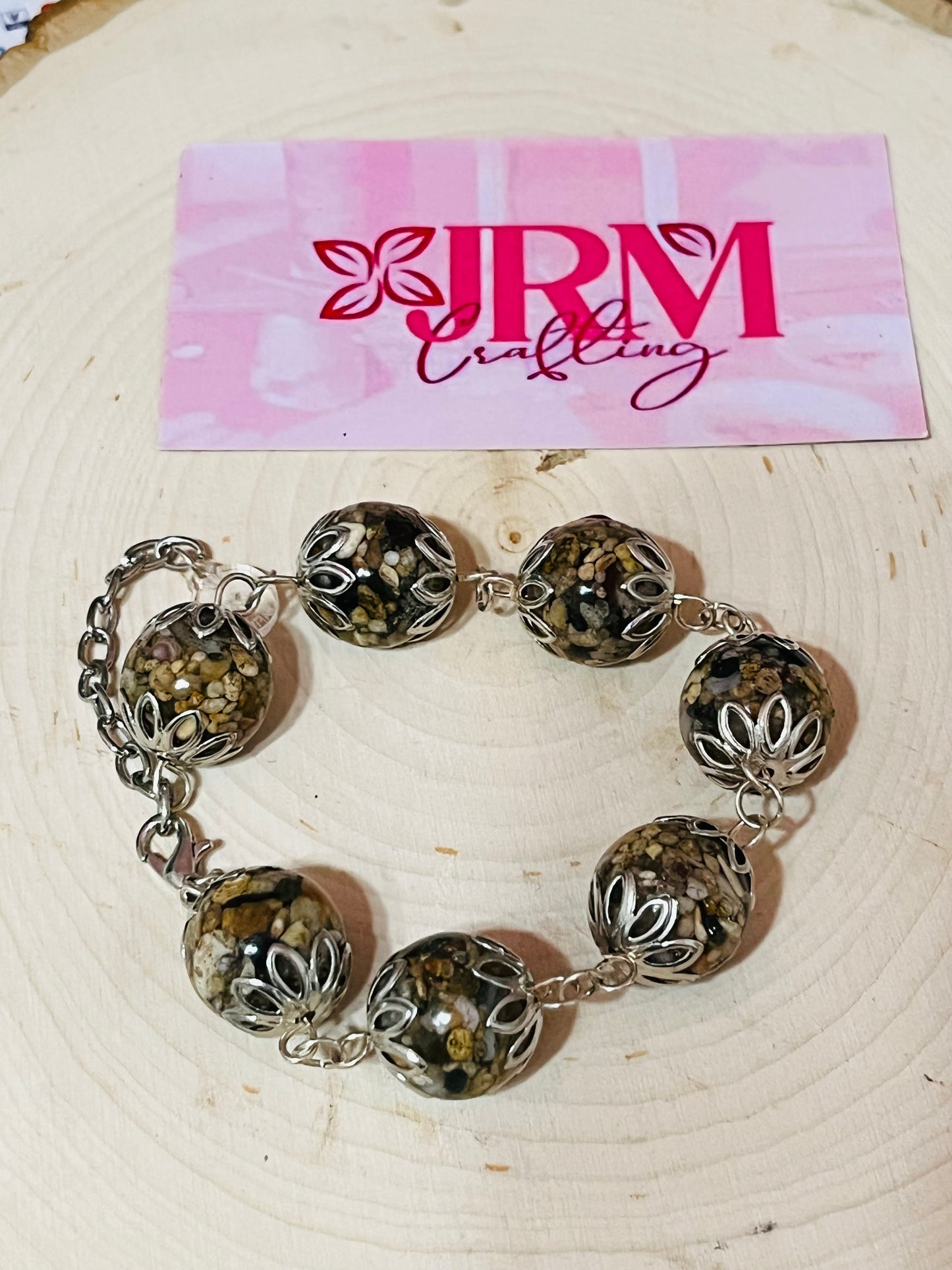 Pulsera artesanal encapsulado de arena de playa