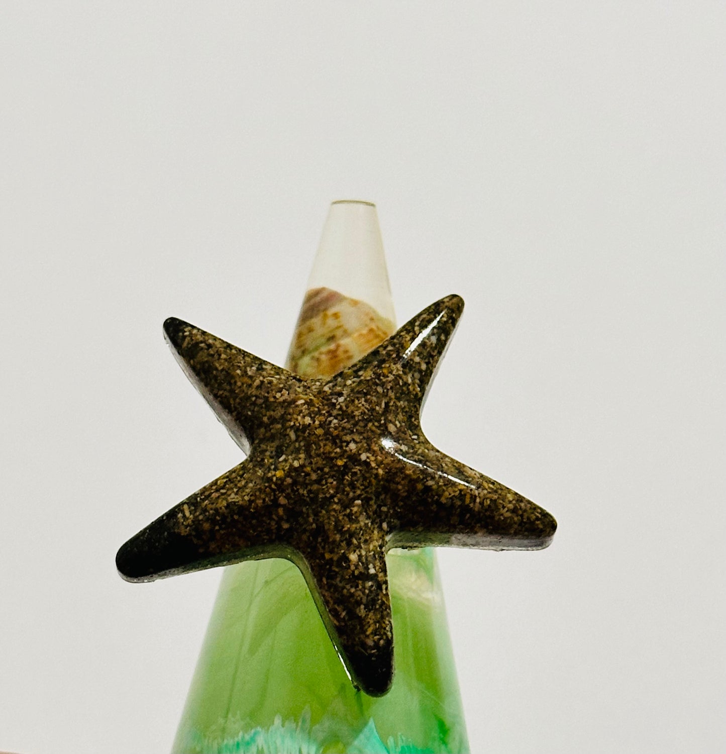 Sortija estrella arena de playa