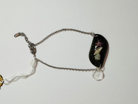 Pulsera arena negra